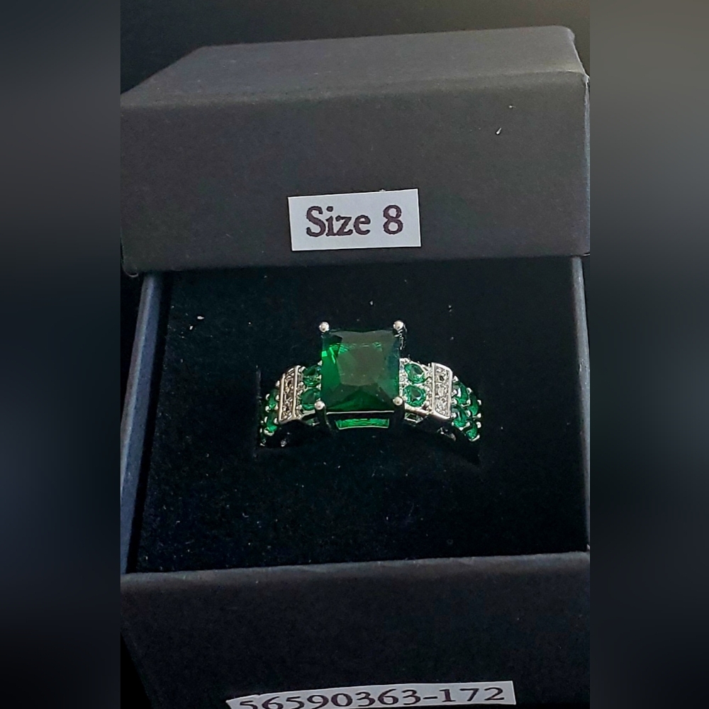 New W.G.F.  4 Ct. Green Emerald Cut Ring